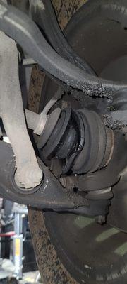 Axle boot torn.  Replaced Half shaft.