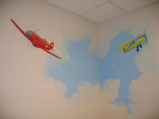 Kid friendly exam rooms- this is the sky room.