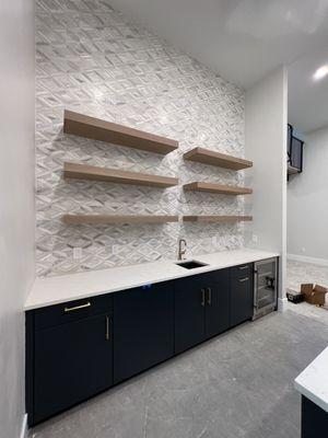 Wet bar cabinets with floating shelves