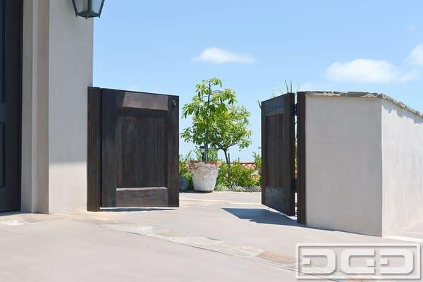 Beautiful handcrafted gates in a Spanish Mediterranean style by Dynamic Garage Door. Serving the Los Angeles historical communities!