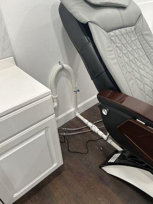 New plumbing installation of a pedicure chair at Salons by JC