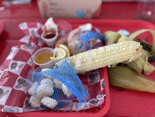 Old bay scallops , shrimp and side of corn on the cob