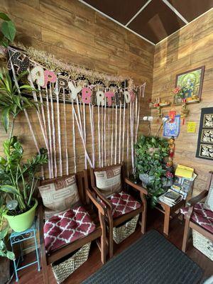 Cute waiting area sets the tone with Thai decor and calming music