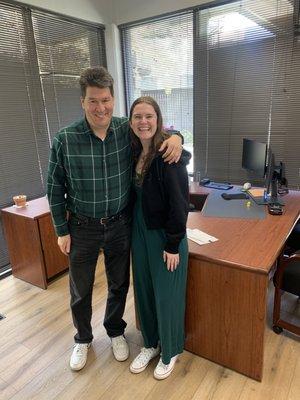 Agents (Dave V. and Molly) celebrating St. Patrick's Day in the office