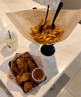 Half Size (Drumsticks 3pics & Wings 4pcs) Combo with a side of fries. The sweet chili sauce was good; the garlic sauce was just ok