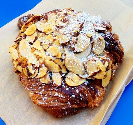 Chocolate Almond Croissant that my friend got - National Croissant Day, 01.30.21. Flaky, buttery & delicious. Highly recommend getting too!