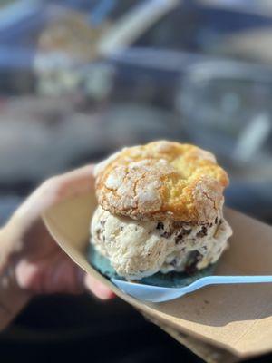 Monster cookie on the bottom, butter pecan ice cream and a gooey butter cookie on top.