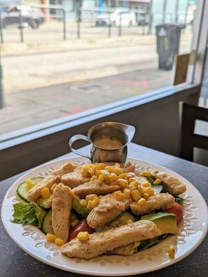 Southwestern salad - chicken, lettuce, tomato, cucumber, avocado and corn