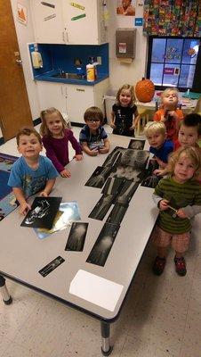 Students putting together an x-ray skeleton