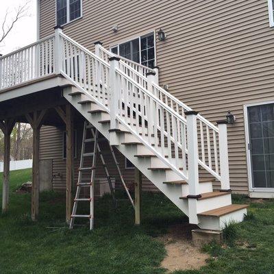 New stairs and railings to make an old deck look new