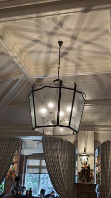 The large chandelier in the main dining room of Jasmine Porch