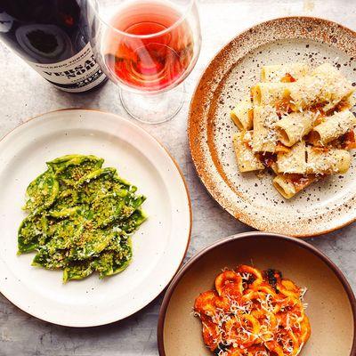 Handmade pasta offered inside the shop. Pick a bottle from the wine shop and order at the counter.