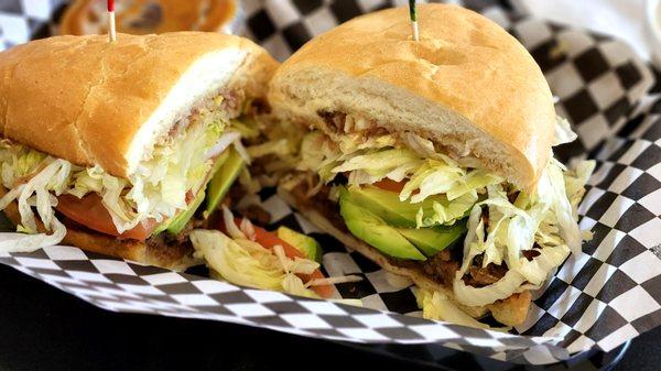 Carne Asada Torta; 
 Beans, Lettuce, Tomatoes, Avocado, on Telera Bread; fantastico!