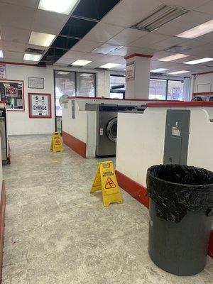 Leaking a/c...at least there are signs on floor and buckets