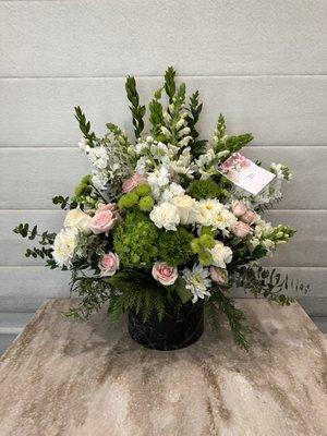 24" x 19" Flower arrangement (Size Large) -- Asked for green, white, and a hint of color! It was perfect.