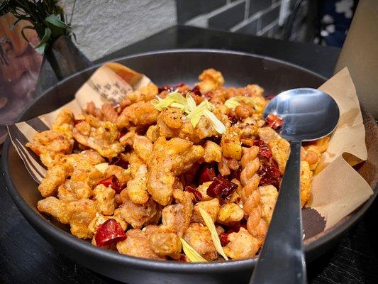 Deep fried  boneless diced chicken in dry chili pepper