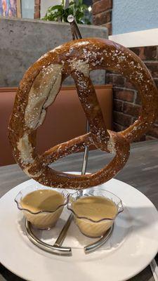 $11 or $12 ginormous pretzel with second beer cheese cup at request. Excellent