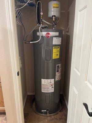 50 Gal heater with Tank booster.