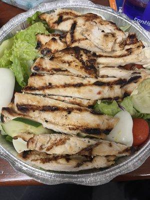 Cobb salad with generous portion of grilled chicken.