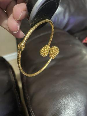 The bracelet attracted to the magnet