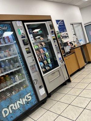 Vending machines + free coffee/water station. Some snacks on the corner (Pringles, granola bars, etc.)