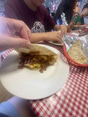 Chorizo, egg, beans and potatoes taco.