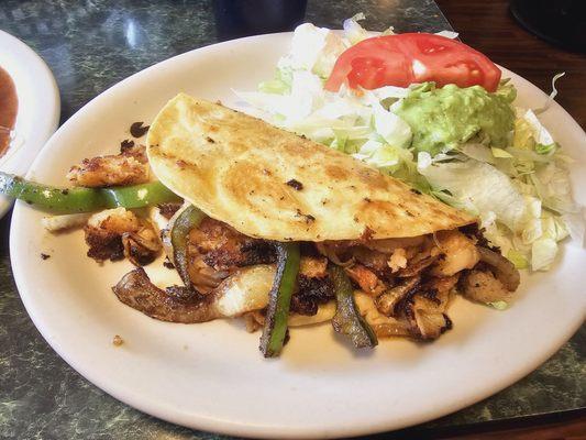 Processed cheese food "blend" overpowered the imitation lobster meat in this lobster quesadilla.