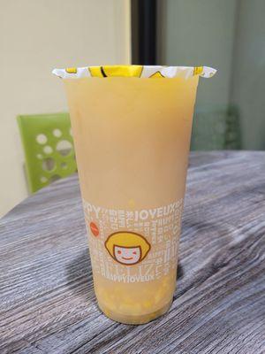 fresh lemon honey green tea with fresh mango chunks (50% sugar, 50% ice)