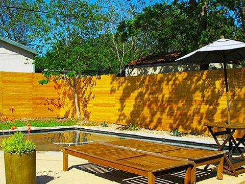 Privacy wooden fencing for backyard and pool