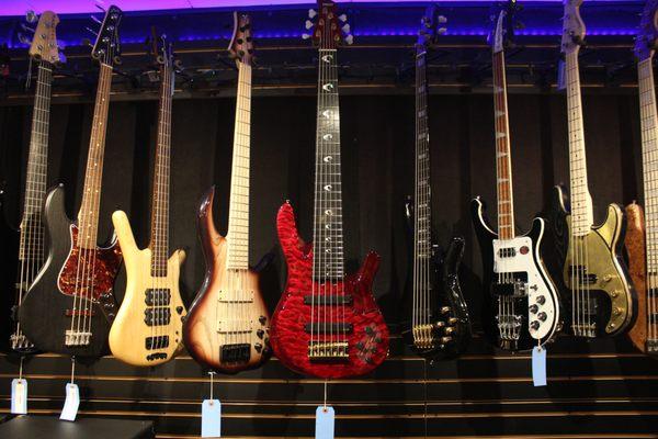 Bass wall! Featuring Marco Bass, Warwick, F Bass, Yamaha, Rickenbacker, and Paoletti