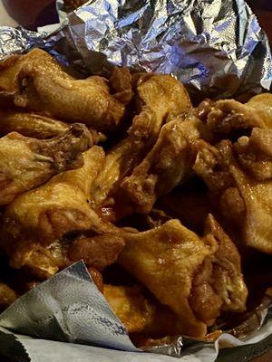 Wings lightly tossed in hot buffalo sauce