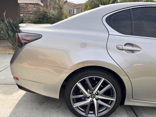 Bumper and quarter panel repaired to the T. Color match is remarkable!!