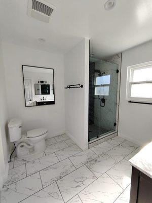 Bathroom remodel walk in shower frame less shower glass door , great job