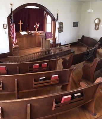 Church with curved pews.