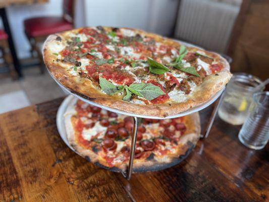 Half eggplant and half meatball ricotta on top and a margarita with "pepperoni cups" on bottom.