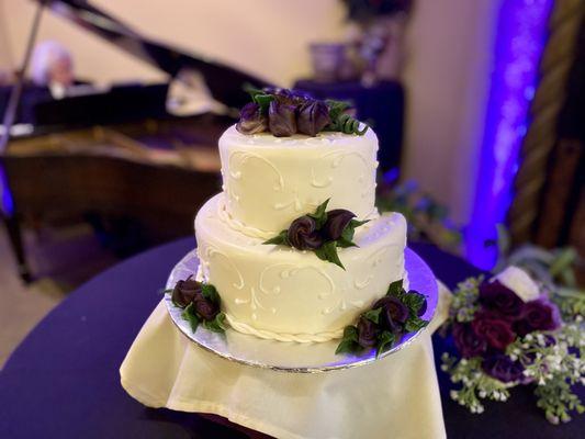 European Rolled Fondant Wedding Cake with handmade marzipan roses