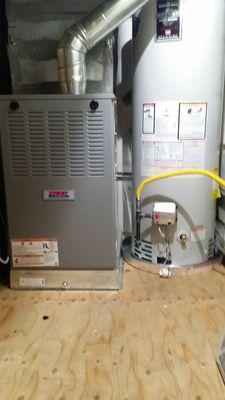 My new furnace and water heater. Notice they redecked my utility closet. It needed it. Thanks!