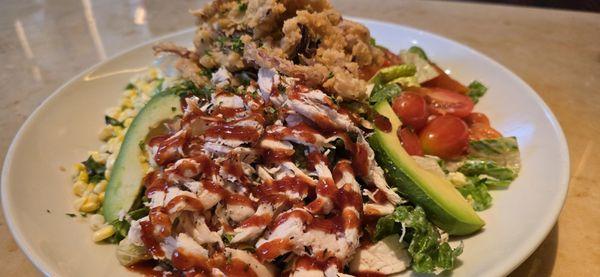 Lettuce, black beans, corn, tomato, cucumber, avocado &  grilled chicken breast w/ bbq sauce & topped w/fried onions