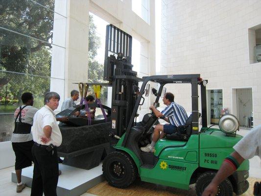 Relocating large 4 ton granite sculpture at Jepson Center for the Arts