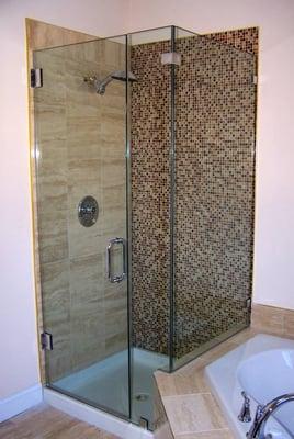 Frameless 1/2" Glass 90° Corner Shower Enclosure with Chrome Hardware.