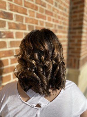 Cut and style with curls