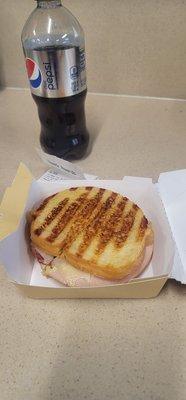 Turkey bacon Swiss panini. Light honey mustard only and black pepper Yummers And a bottle of Diet Pepsi