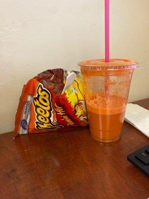 Hot Cheetos and cheese. And a number two juice