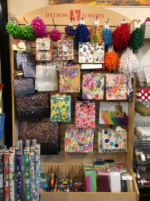 Wrapping paper for gifts and crafts, gift bags and stuffing paper, bows, greeting cards, and birthday cards!