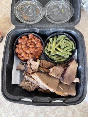 Beef brisket platter with green beans and baked beans