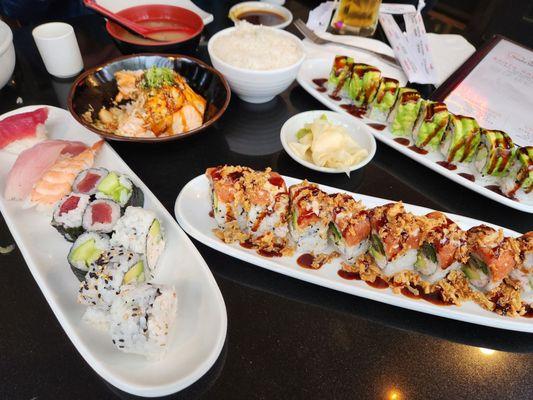 Sushi sampler, volcano cake, dragon roll,  Carillo roll