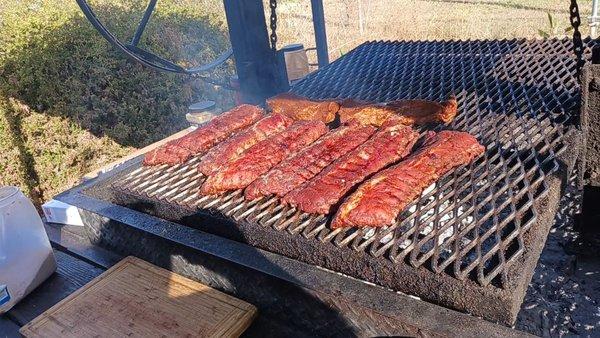 Baby back pork ribs on the grill, Tri Tip behind