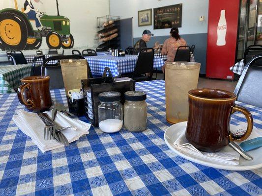 Coffee and tea in old fashioned mugs