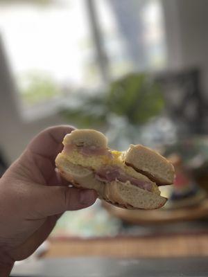 Ham, egg and cheese on an onion bagel.