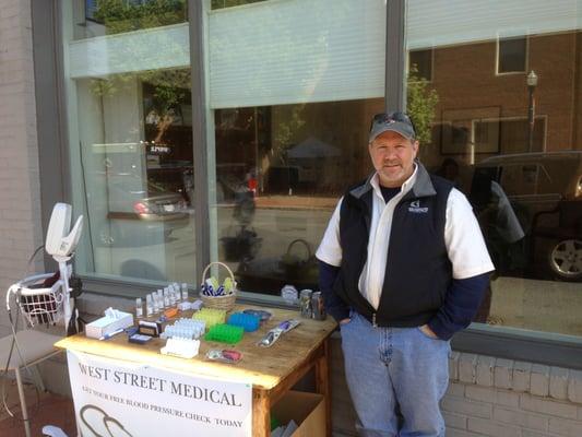 Manning our stand during First Sunday in Annapolis